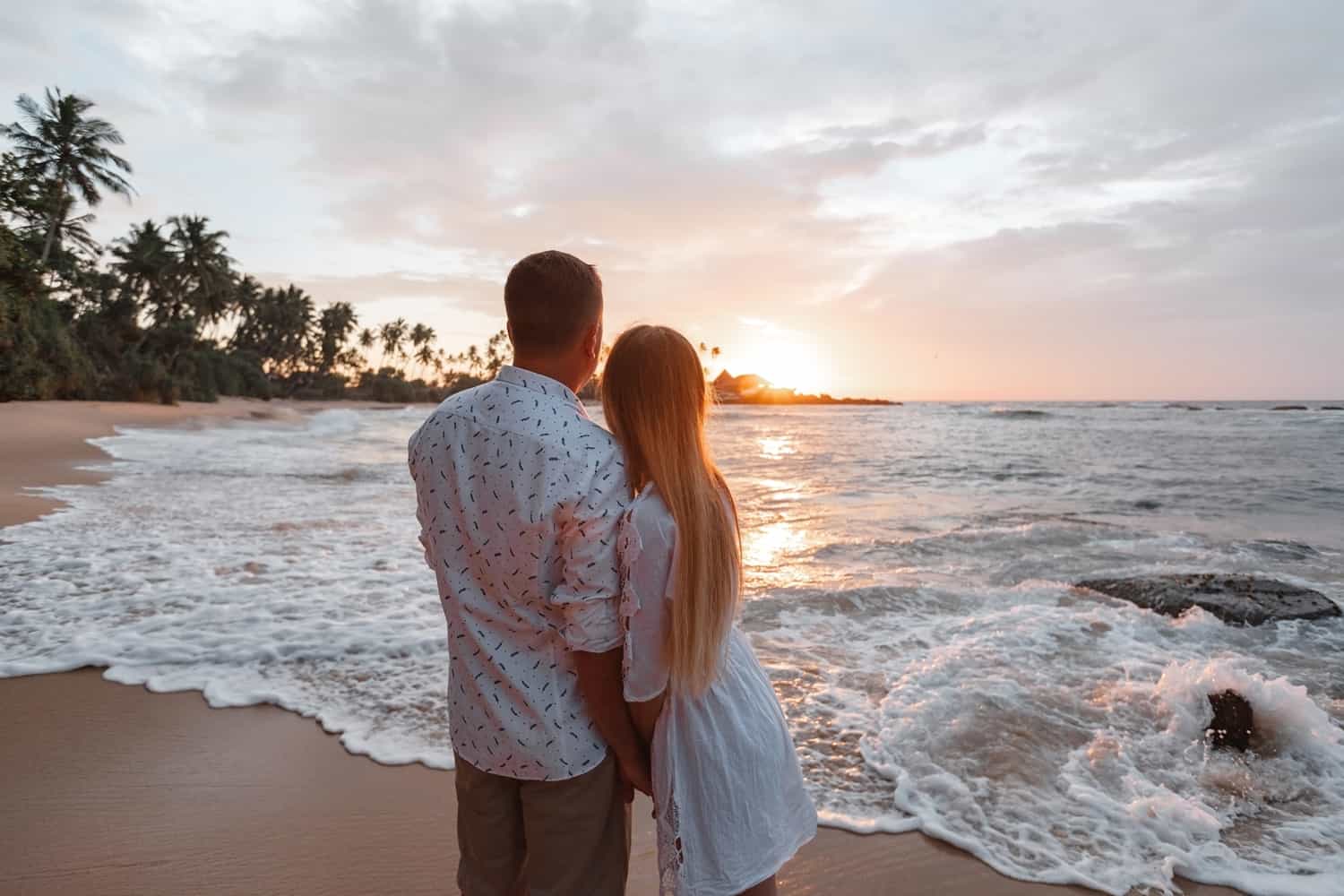 A couple watching the sunset on Sri Lanka’s southern coast