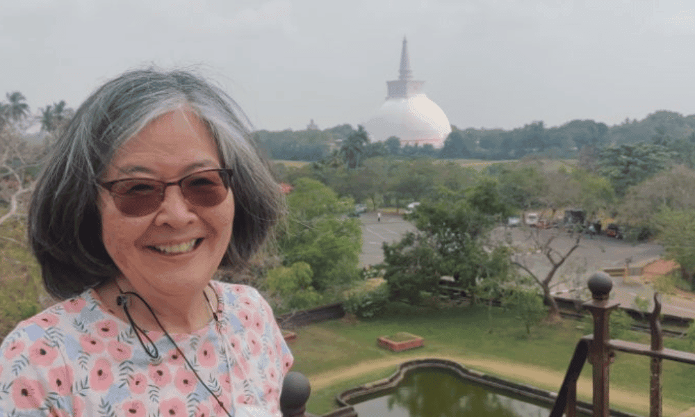 A senior traveller visiting one of Sri Lanka’s cultural landmarks
