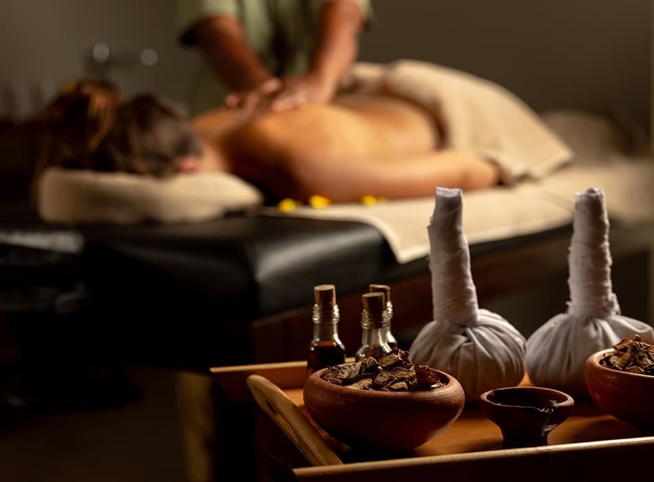 Herbal oils and compresses prepared for a restorative massage